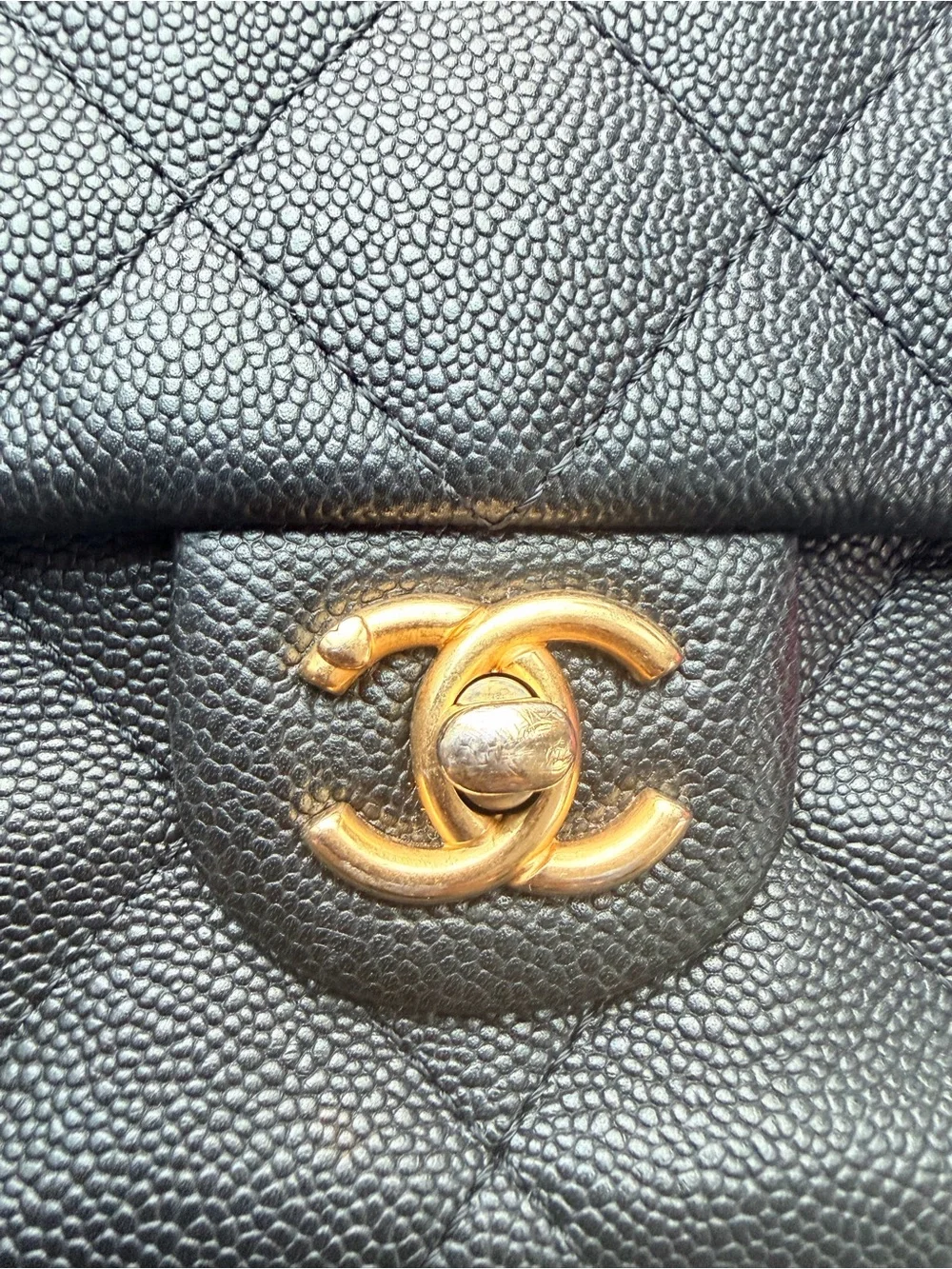 CHANEL Black Quilted Shoulder Bag with Gold Hardware